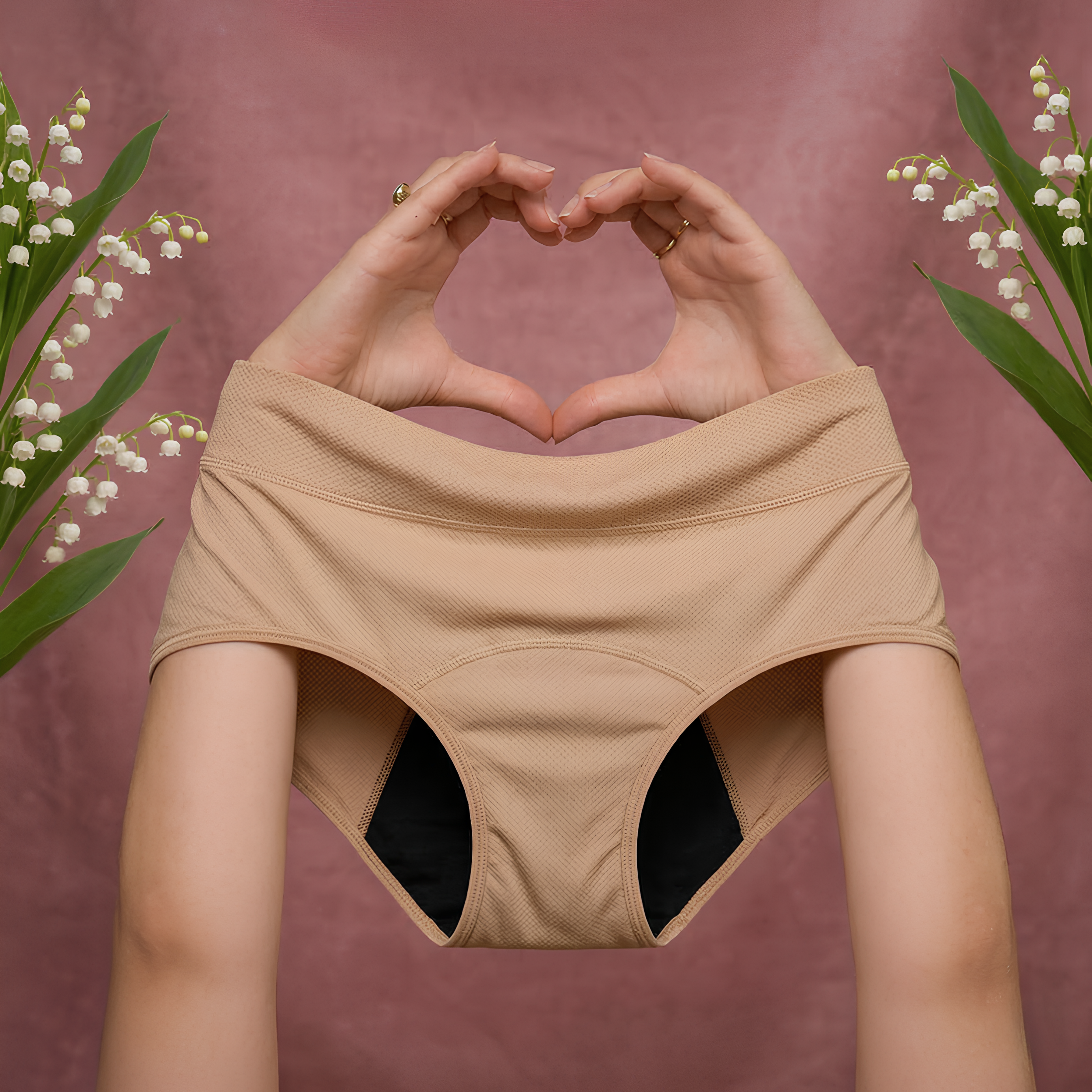 Beige high-waisted bikini with hands forming a heart shape against a pink background with flowers.